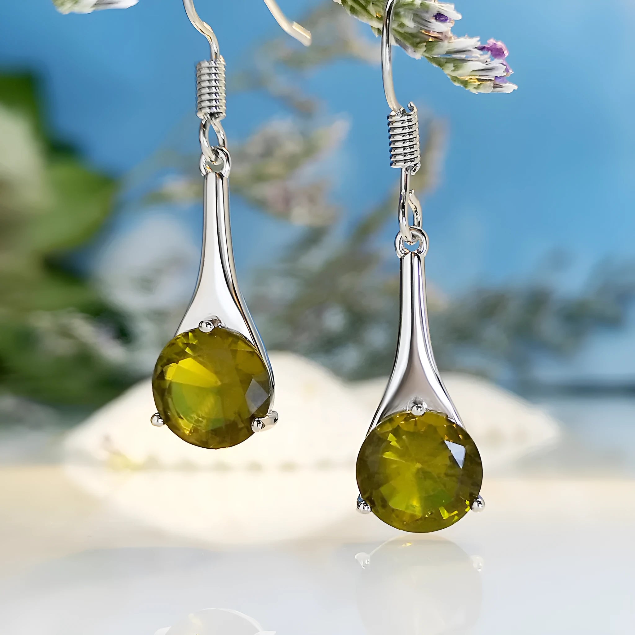 Olive green topaz coloured drop earrings with water drop shape and electroplated finish