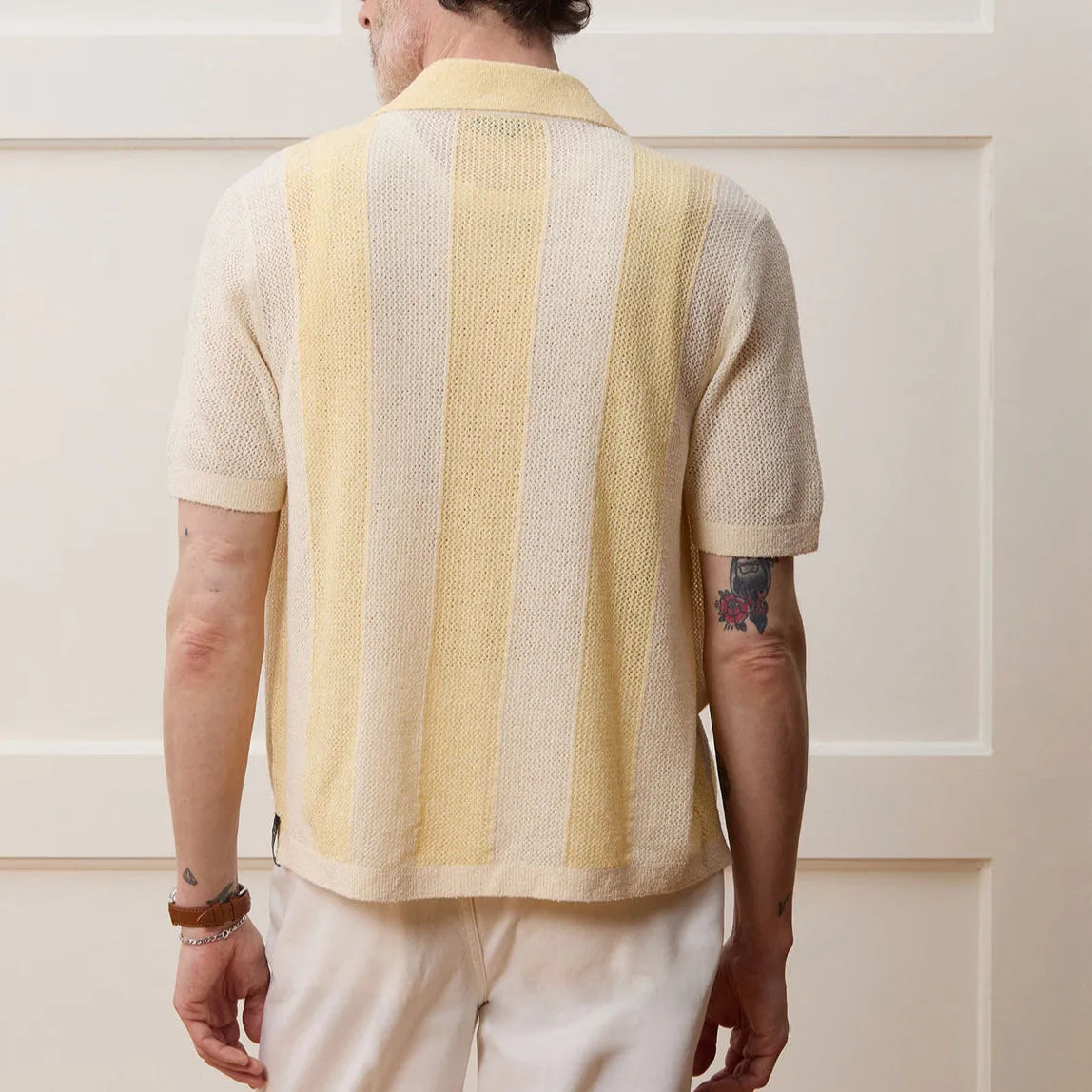 Yellow casual polo shirt with hollow-out detailing and asymmetric design, short sleeves for summer wear
