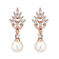 Geometric pearl earrings with micro inlaid zircon and flower design in gold plating