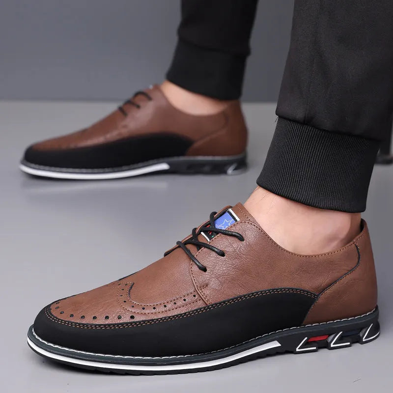 Men's casual leather shoes in black with rubber sole, low top, and leather toe cap.