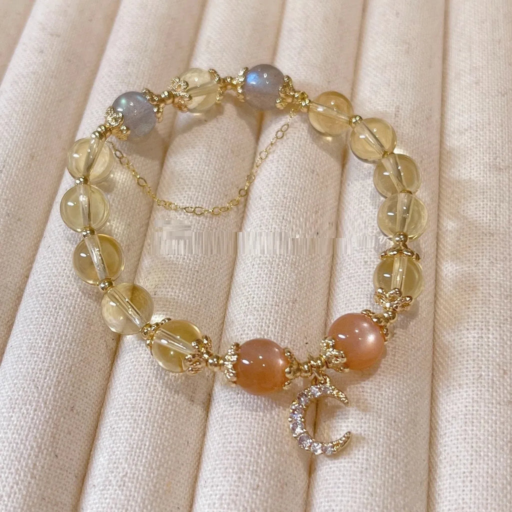 Chinese style crystal bracelet with 14K gold electroplated finish and diamond-shaped design