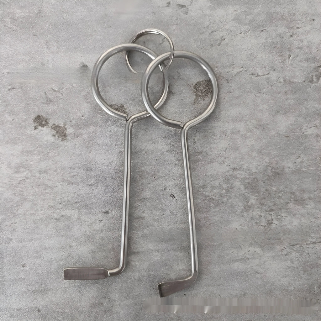 Two alloy wrench tools from a portable family maintenance set on a plain background.