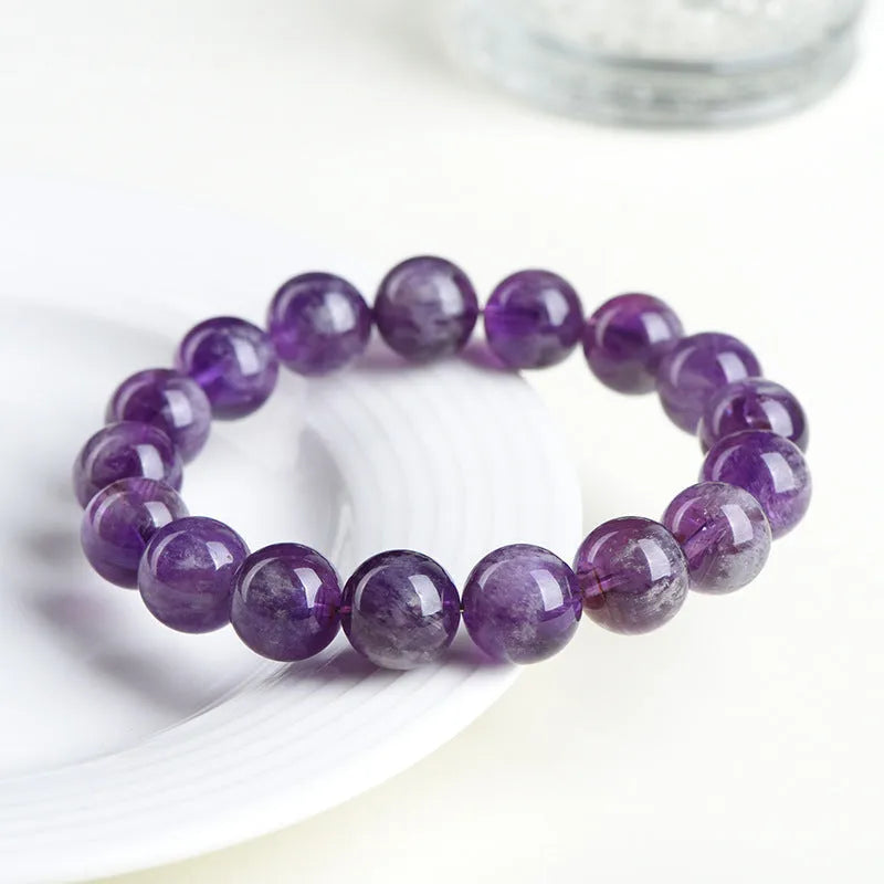 Natural snow mountain purple feather amethyst crystal bracelet with scattered geometry beads and Ruyi design