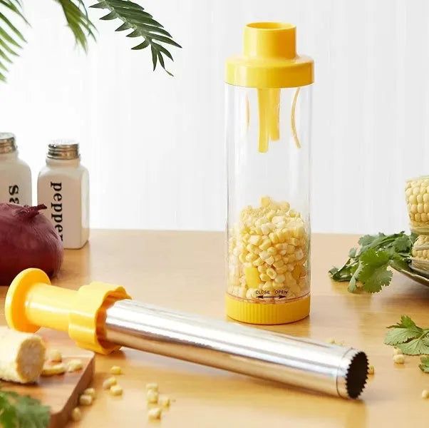 Yellow cylindrical corn stripper tool with stainless steel blades for removing kernels from corn cobs
