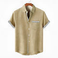 Linen loose-fit short sleeve casual shirt with an ocean fish pattern on the lapel.