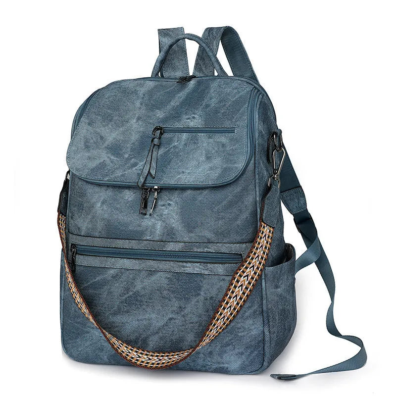 Retro solid colour college backpack with curved shoulder straps, shown in a choice of colours.