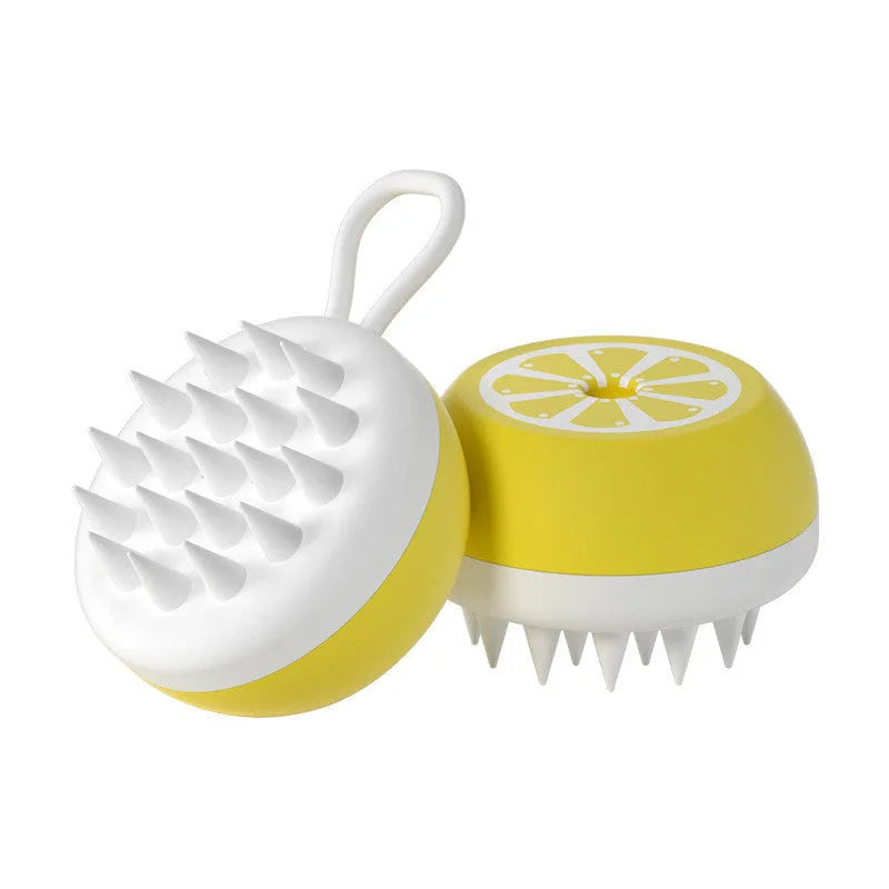 Yellow silicone pet bath brush with massage nodes and comb teeth for dog and cat grooming during washing