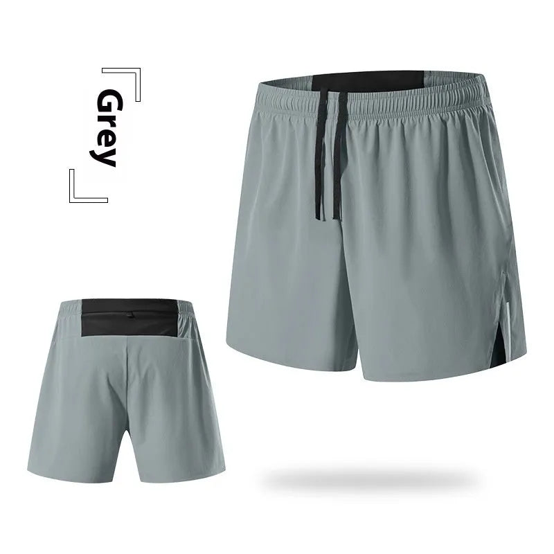 Men's red off-road running shorts with high waist and loose fit on a running trail.