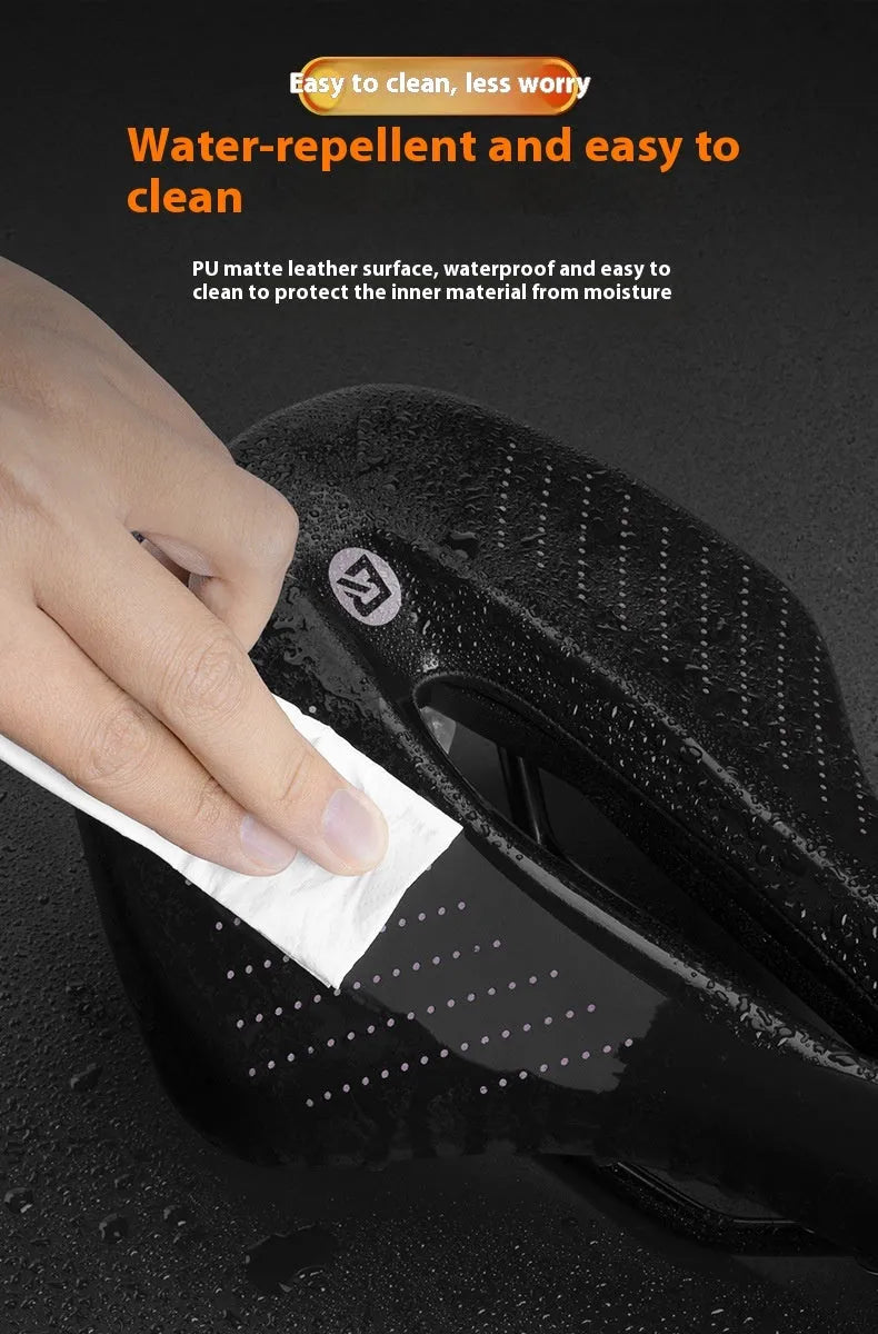 Black and pink PU foam bicycle seat cushion for M size mountain bike saddles.