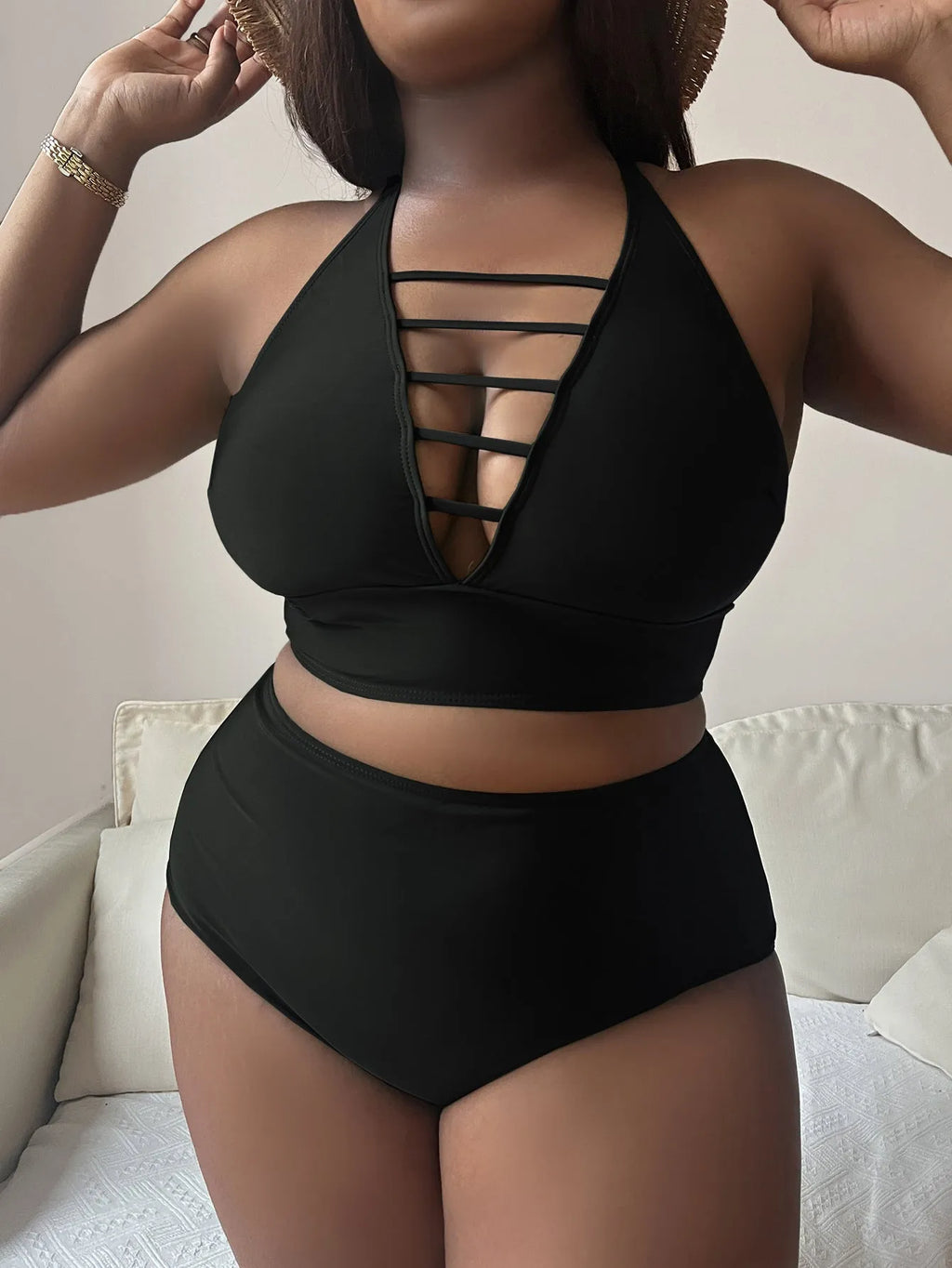 Plus size halter bikini set with adjustable cross straps and high-waist briefs in solid colour