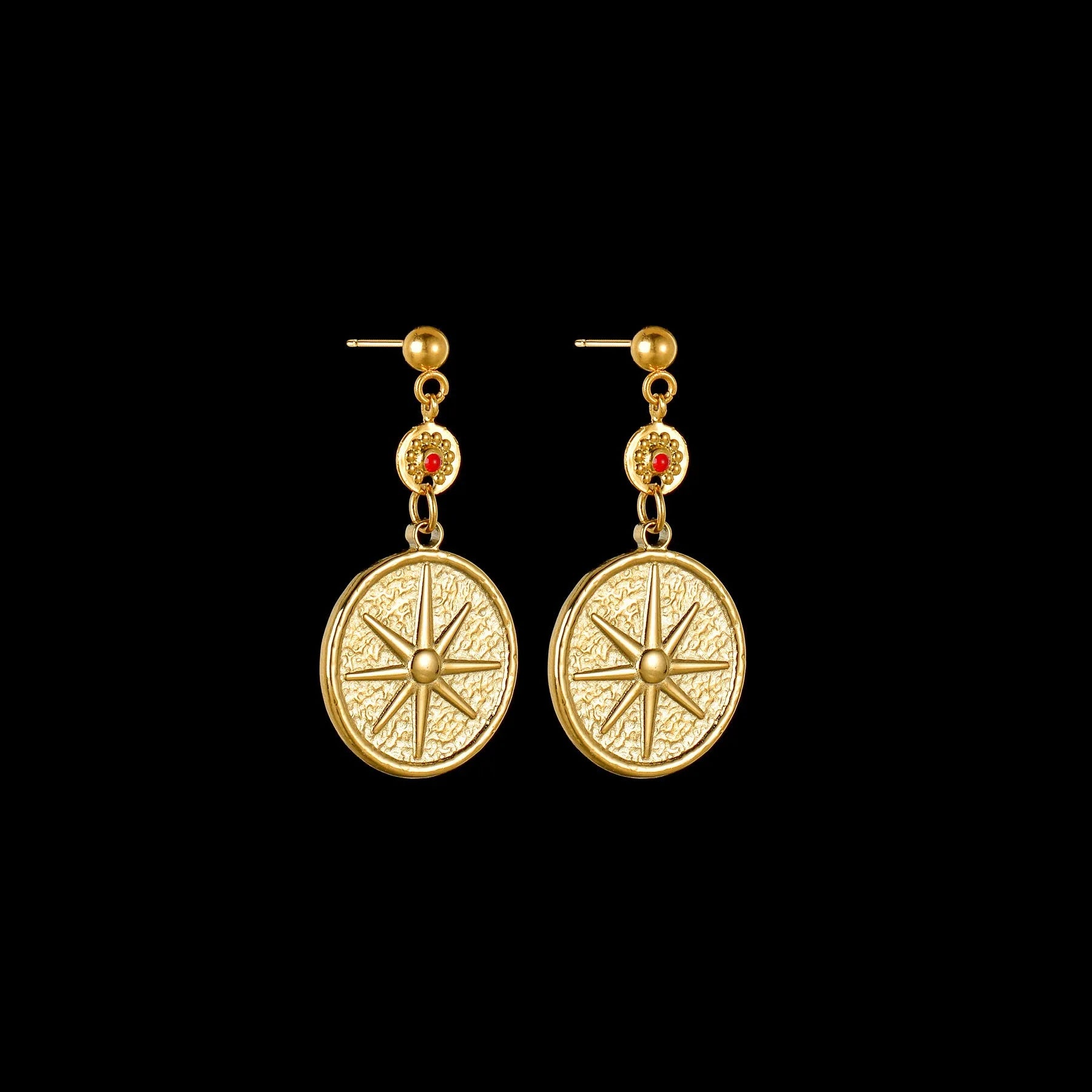 Geometric stainless steel drop earrings showing eight awn star, eye, and shell sun designs