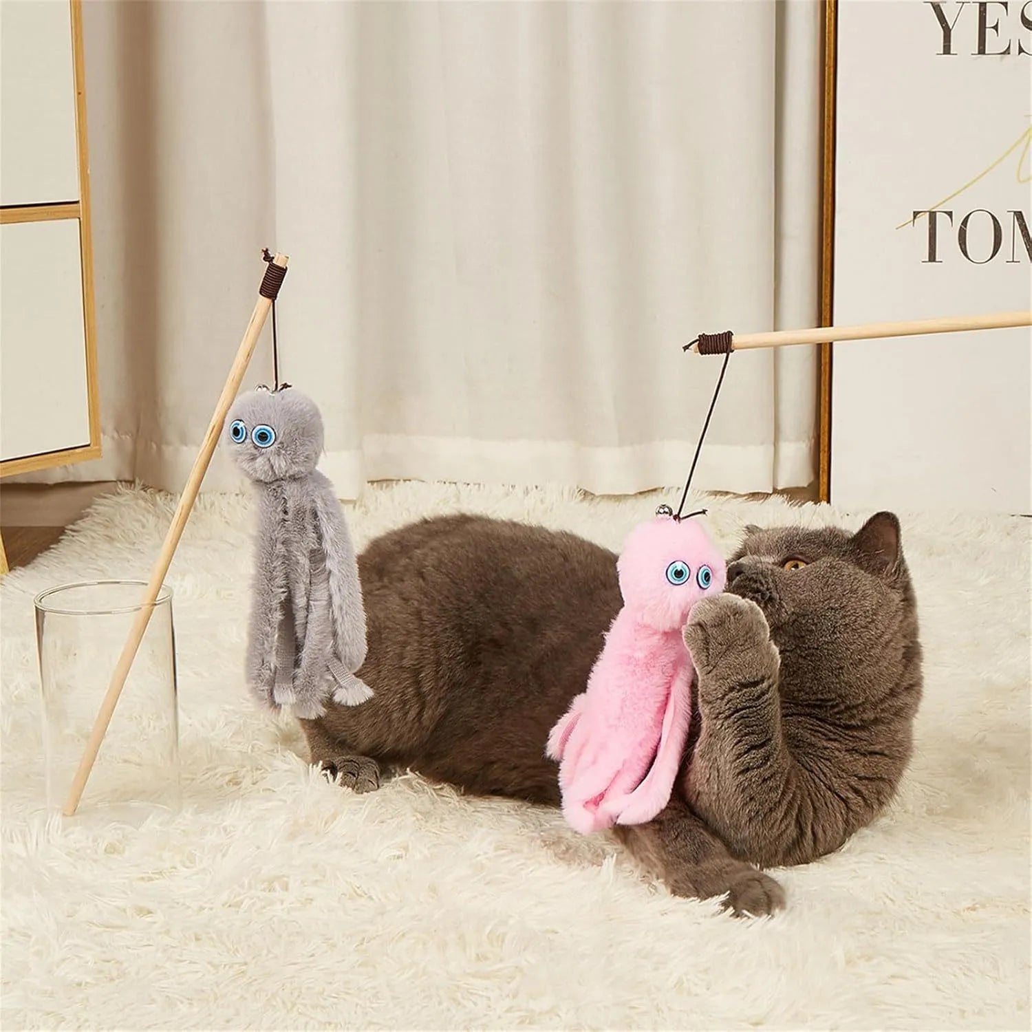 Octopus design cat toy with long stick in bright colours for indoor kitten play