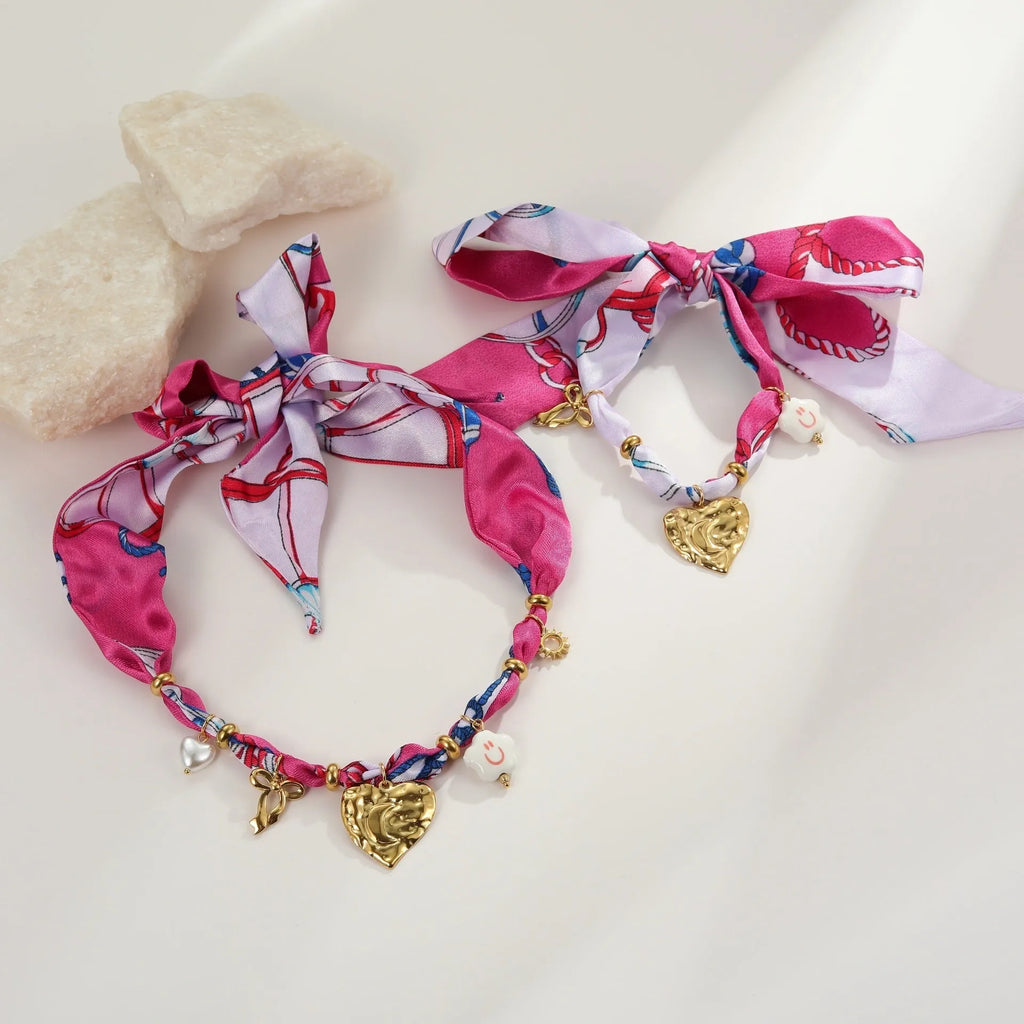 Stainless steel 18K gold-plated necklace and bracelet set with geometric silk scarf pendant