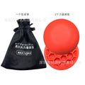 Orange circular rubber golf training mat for swing practice and centre of gravity work