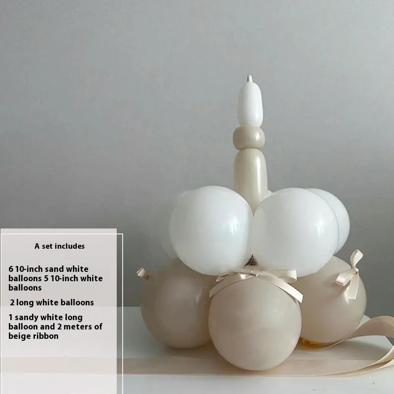 DIY balloon bouquet cake kit with assorted coloured balloons and a clear centrepiece balloon for party decorations.