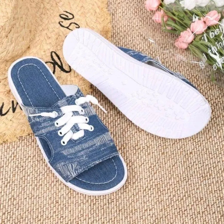 Blue canvas flat slippers for women with rubber soles and Roman-style slip-on design
