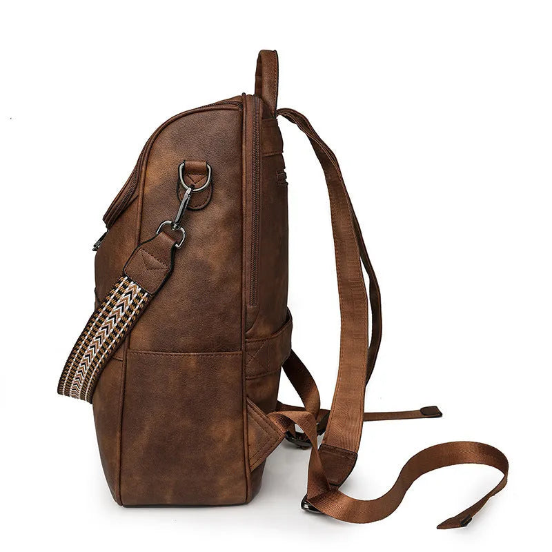 Retro solid colour college backpack with curved shoulder straps, shown in a choice of colours.