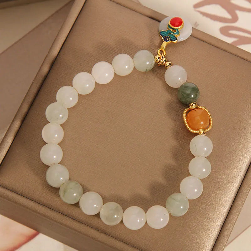 Women's ice jade crystal bracelet with Xiangyun peace buckle and pearl accents