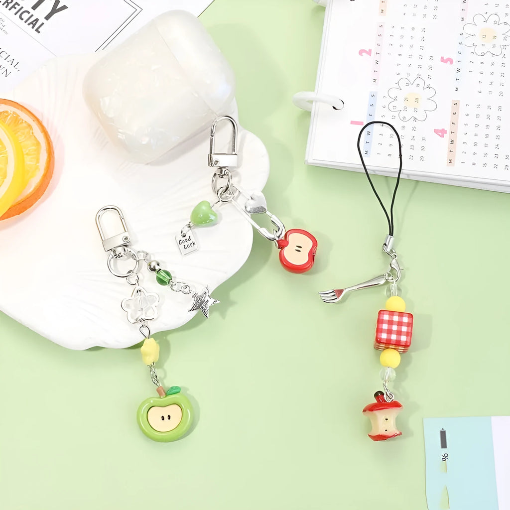 Plastic resin mobile phone keychain with fruit pattern including apple and strawberry designs