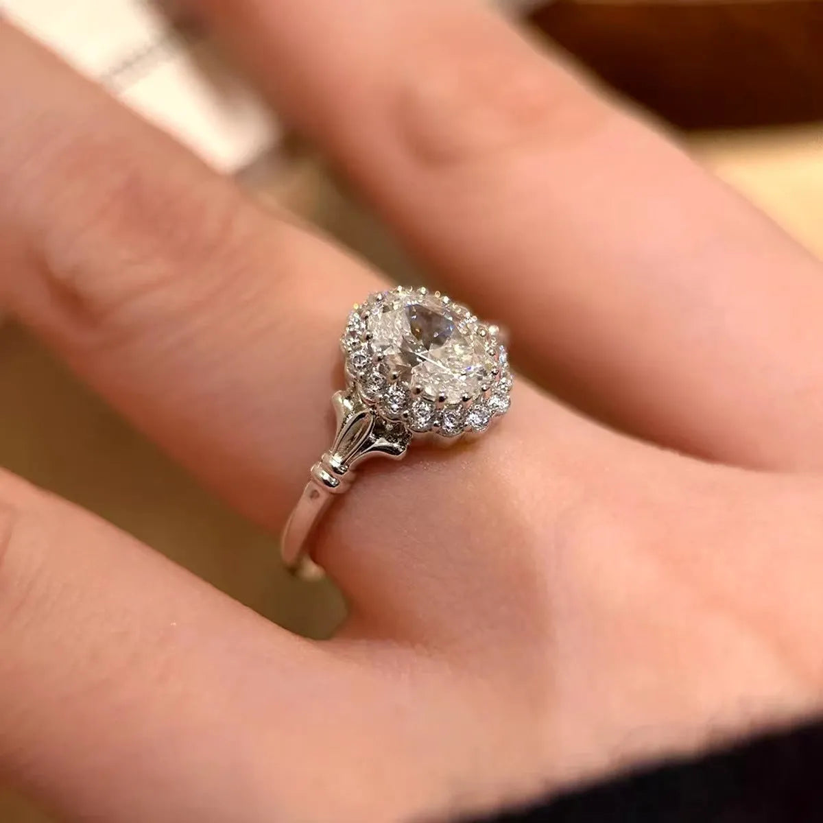 Silver geometric ellipse ring with diamond treatment and adjustable opening mechanism