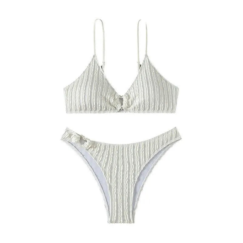 White women's V-neck split swimsuit with sleeveless design and matching shorts