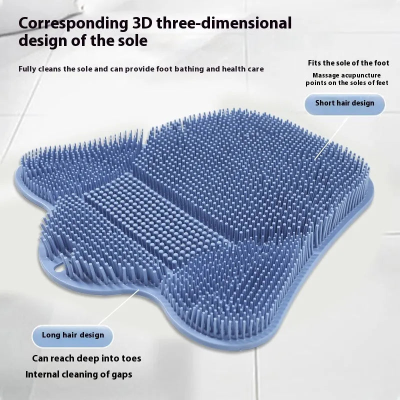Blue silicone bath massage cushion mat for body scrubbing, shown on a bathroom surface.