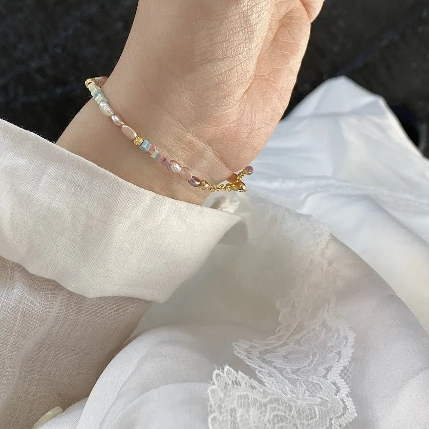 Natural pearl bracelet and necklace set with purple 14K gold accents and silver elements