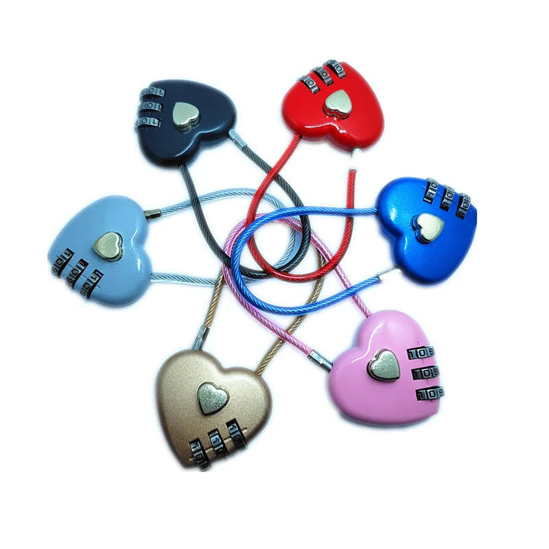 Peach heart design wire rope lock in ABS plastic, shown with steel cable, for securing bicycle helmets.