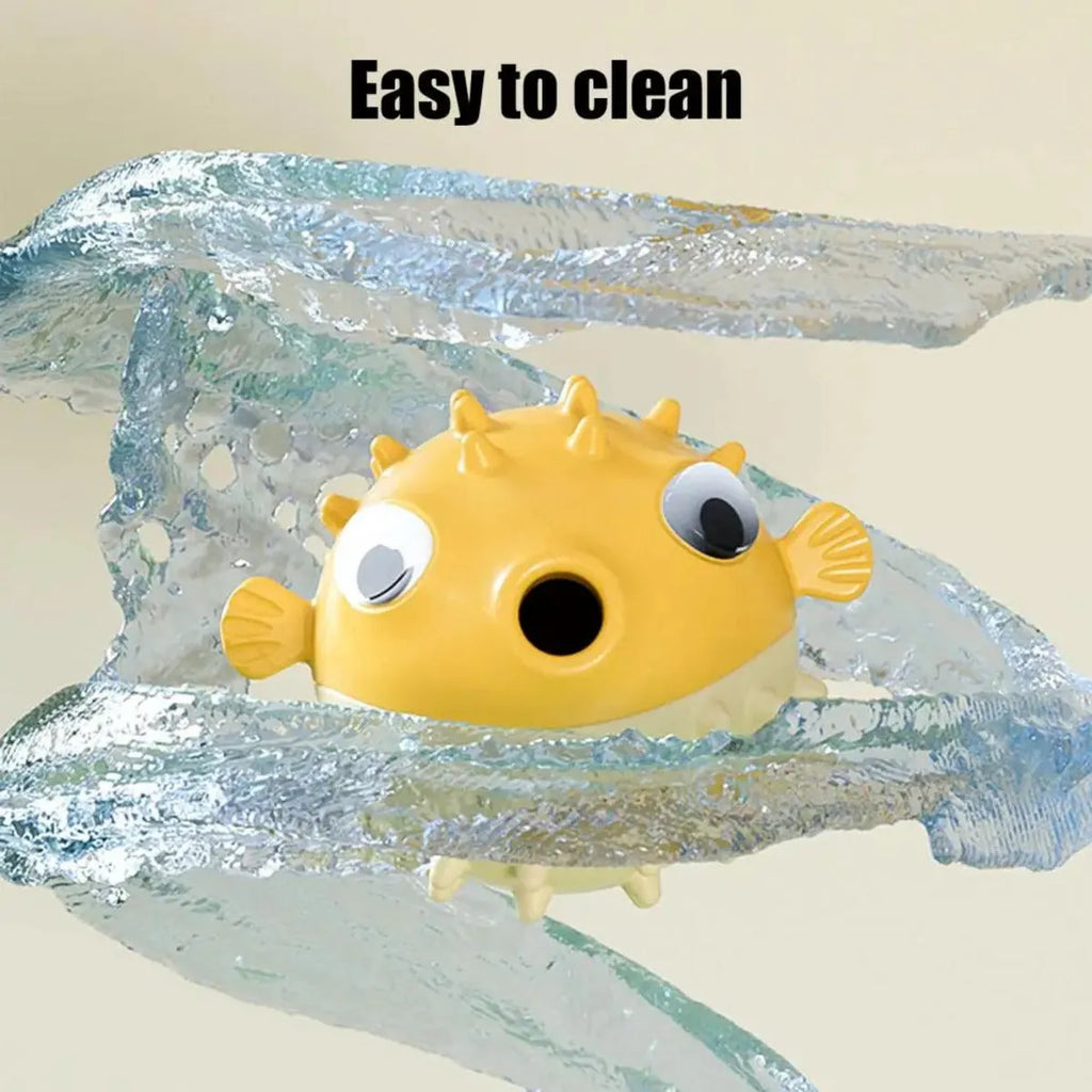Yellow vinyl fish-shaped dog chew toy with textured surface for aggressive chewers.