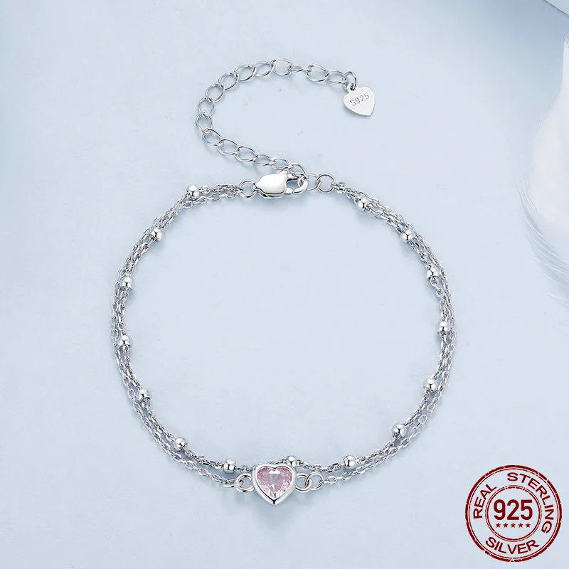 Women's sweet heart-shaped 925 sterling silver bracelet with adjustable chain on wrist