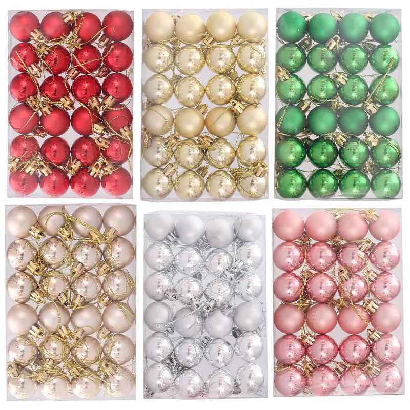 Boxed set of 24 plastic Christmas tree decorations in gold, silver, red, green, champagne gold, and rose gold.