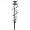 Cast iron hummingbird garden rain gauge with glass measurement tube showing 1-20 scale
