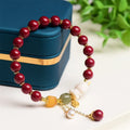 Women's natural beeswax and purple gold sand bracelet with cinnabar rabbit charm