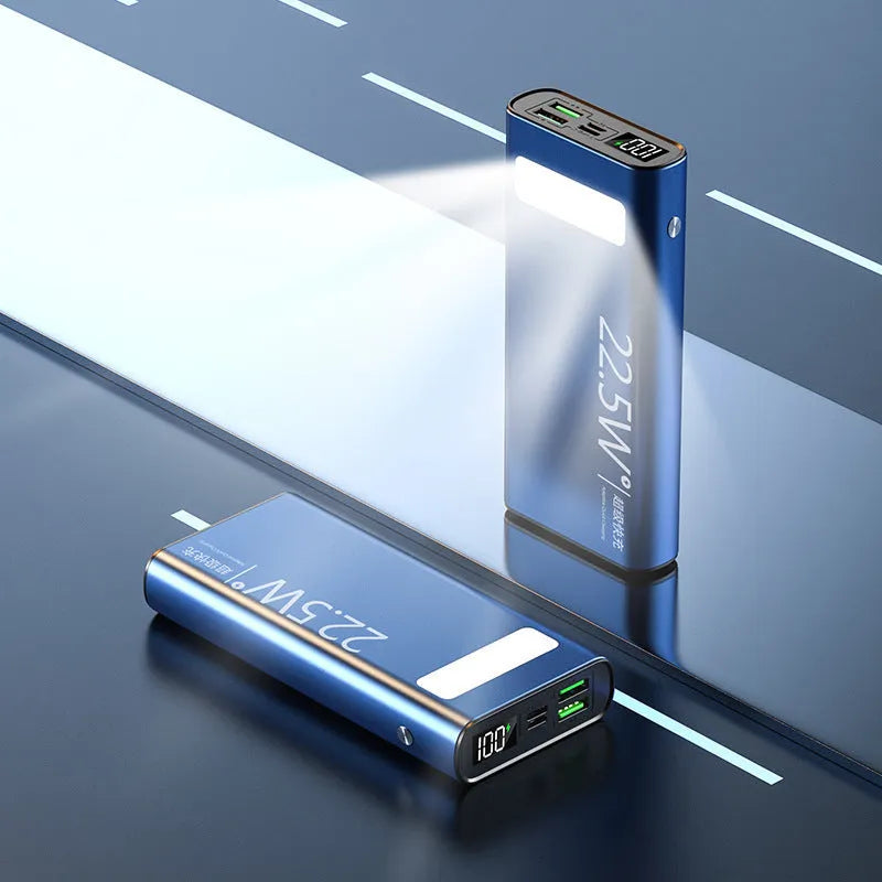 Black alloy 20000mAh power bank showing LCD display and LED flashlight, measuring 140x66.5x27.5mm.