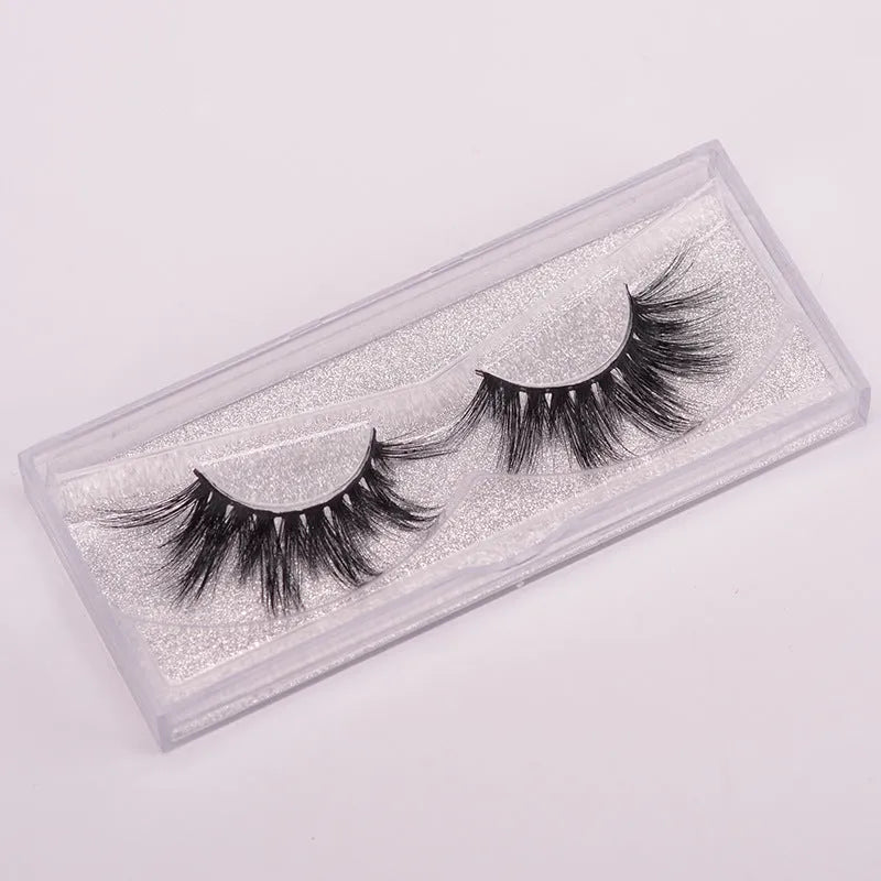 Affectionate brand 5D mink false eyelashes set with storage case and brush on a white background.