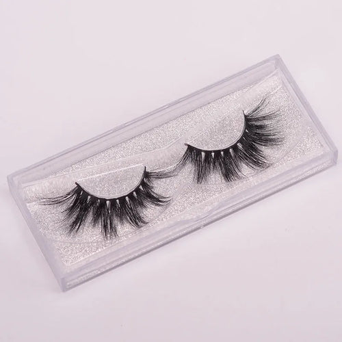 Affectionate brand 5D mink false eyelashes set with storage case and brush on a white background.