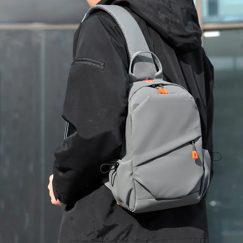 Black mens waterproof polyester crossbody bag with single shoulder strap in casual style