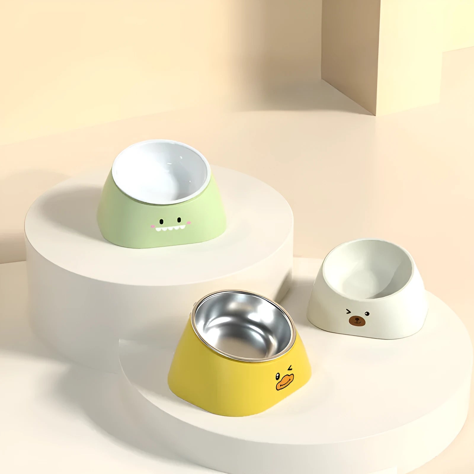 Green tilted pet bowl with stainless steel insert for cervical spine support during feeding