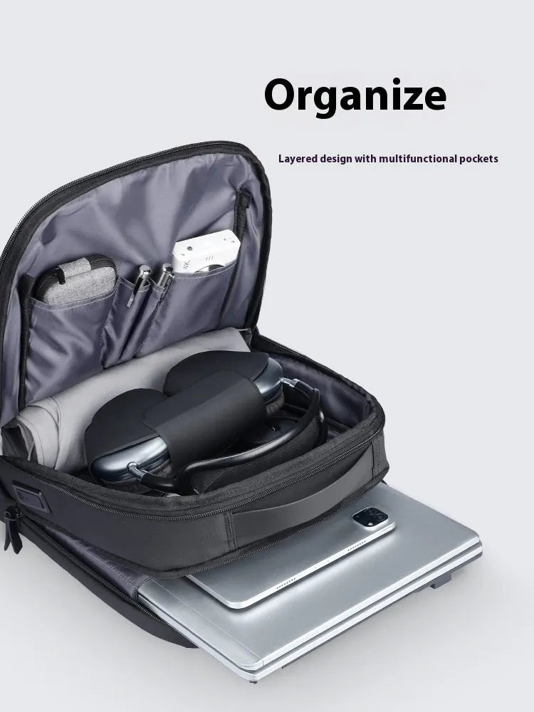 Graphite grey USB business backpack with Oxford cloth construction and visible stitching details