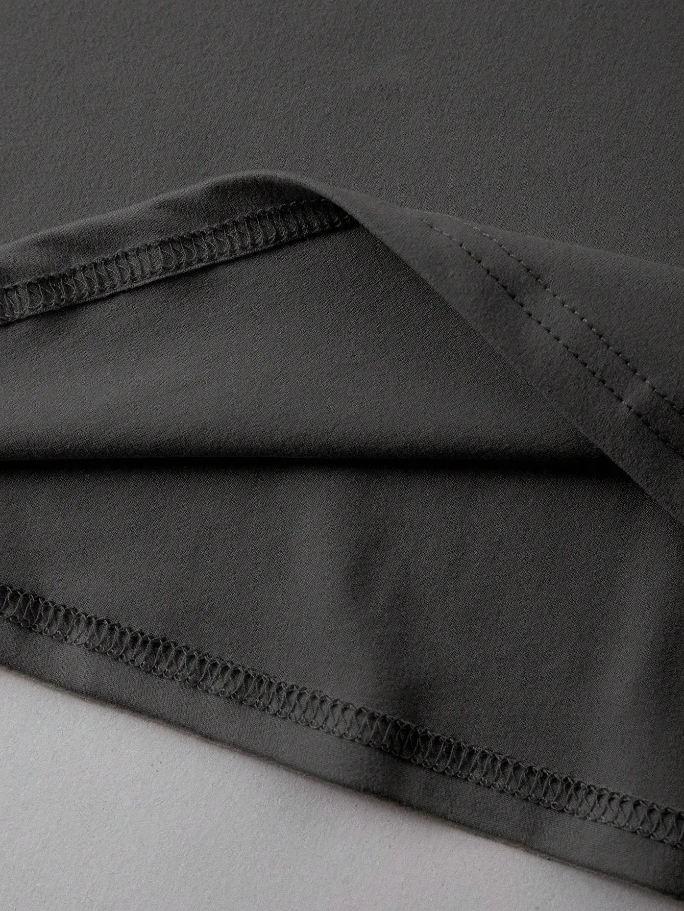 Loose straight cut cotton T-shirt in black green grey orange colours with round neck