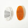 White and yellow plastic bicycle reflector spoke decorations showing 7.2cm length and 3.5cm width dimensions