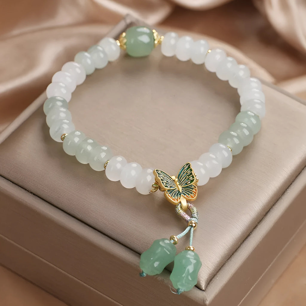 Green Tian Shan Cui abacus beads jade bracelet with butterfly tassel and pearl accents