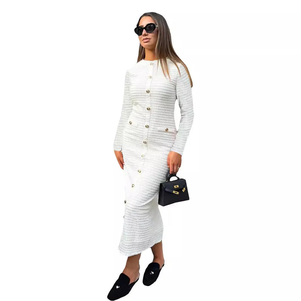 French retro slim fit knitted long sleeve dress in black with button detail and one-step skirt