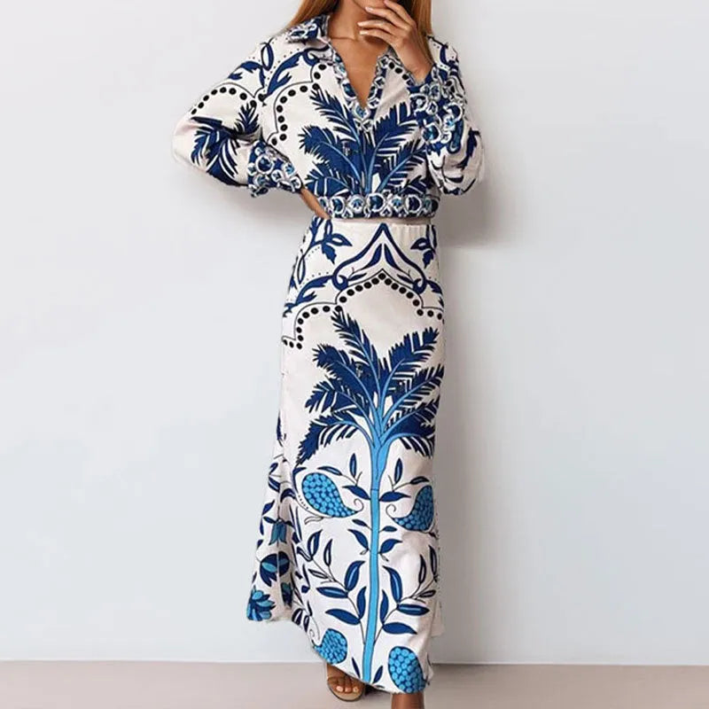 Women's casual floral print two-piece set with long sleeve top and long skirt on a hanger.