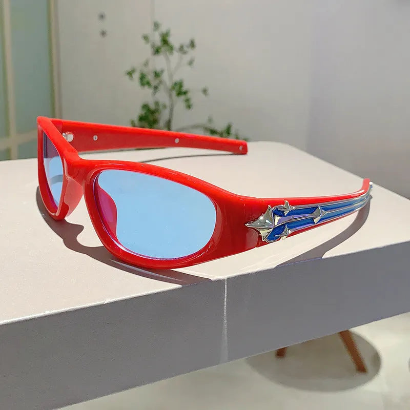 Sports sunglasses with a polycarbonate frame and lenses, shown in a choice of colours including black, red, and transparent gray.
