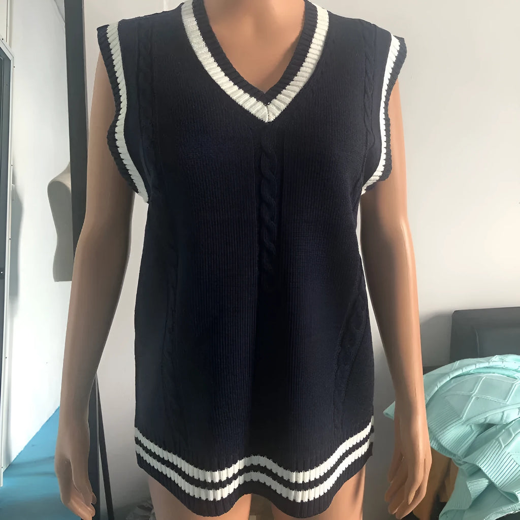 Women's slim-fit knitted V-neck waistcoat with striped stitching detail in dark blue.