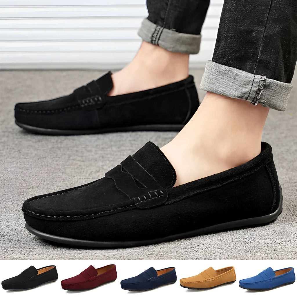 Men's solid colour suede leather slip-on loafers with round toe and flat rubber sole.