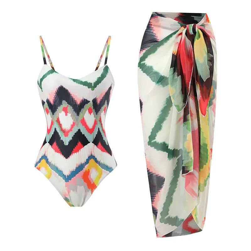 Women's two-piece swimsuit set with matching hip skirt in striped and gradient patterns