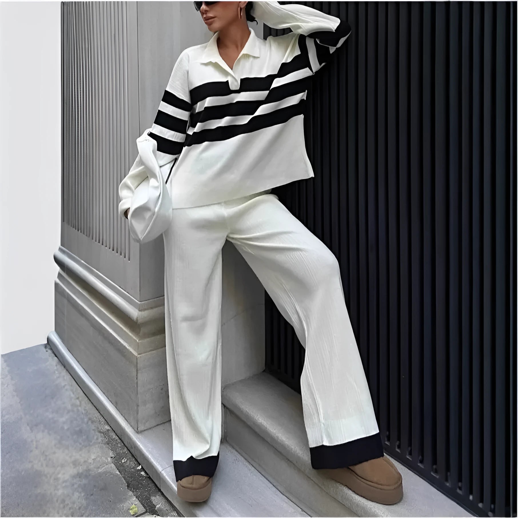 Women's black knitted two-piece set with polo collar and striped contrast colour design