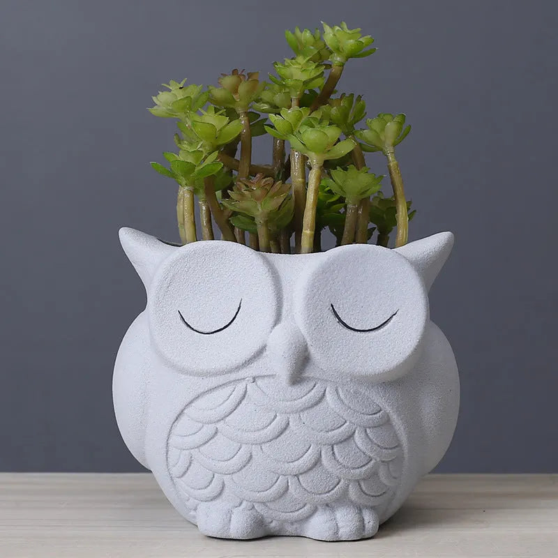 Handmade frosted ceramic flower pot with cartoon owl design for succulents.